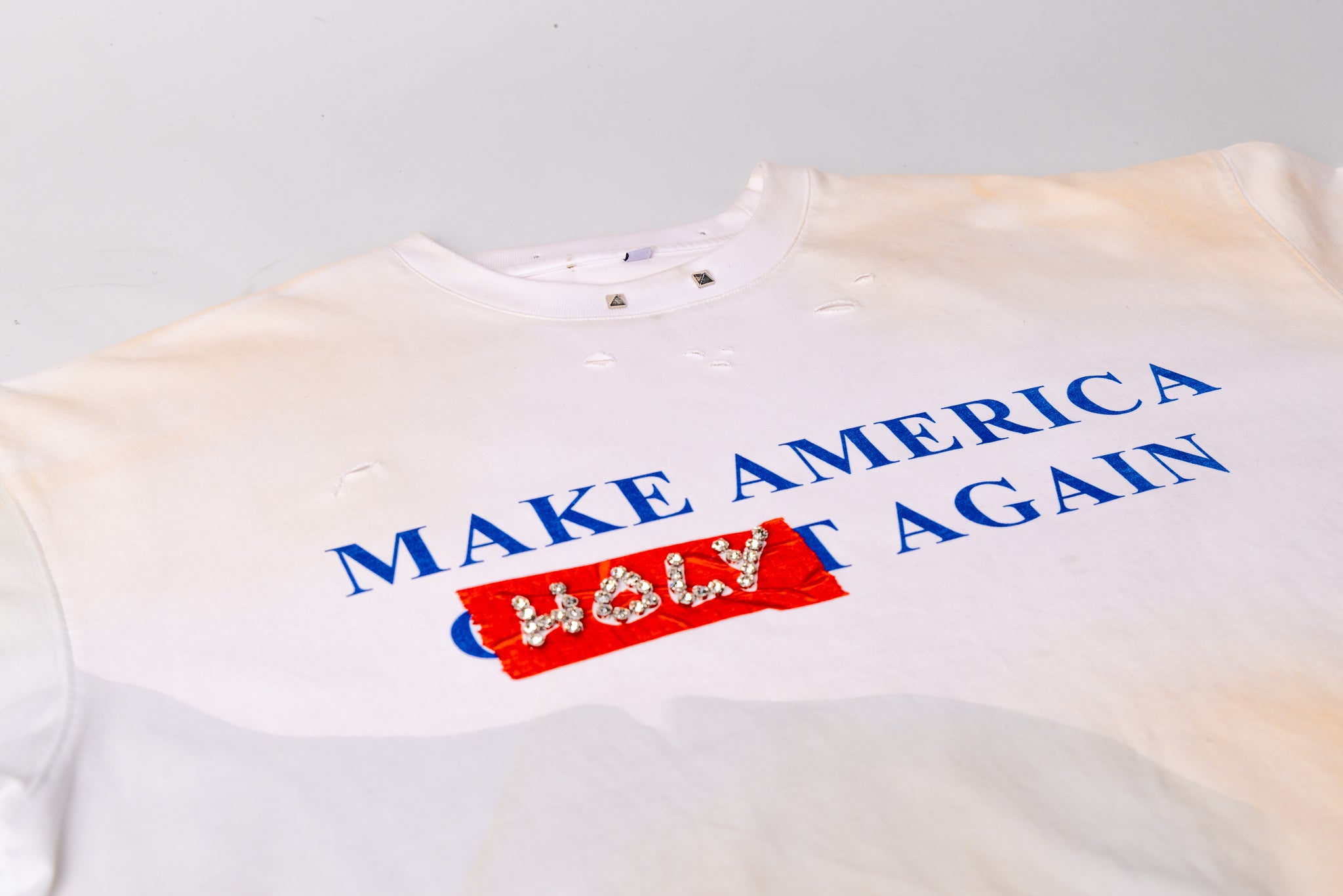 M.A.H.A TAPE TEE IN WHITE